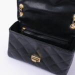 black-quilted-mini-handbag-with-chain-handle-quater